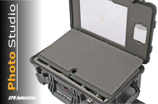 Pelican Studio Case shown with laptop compartment open